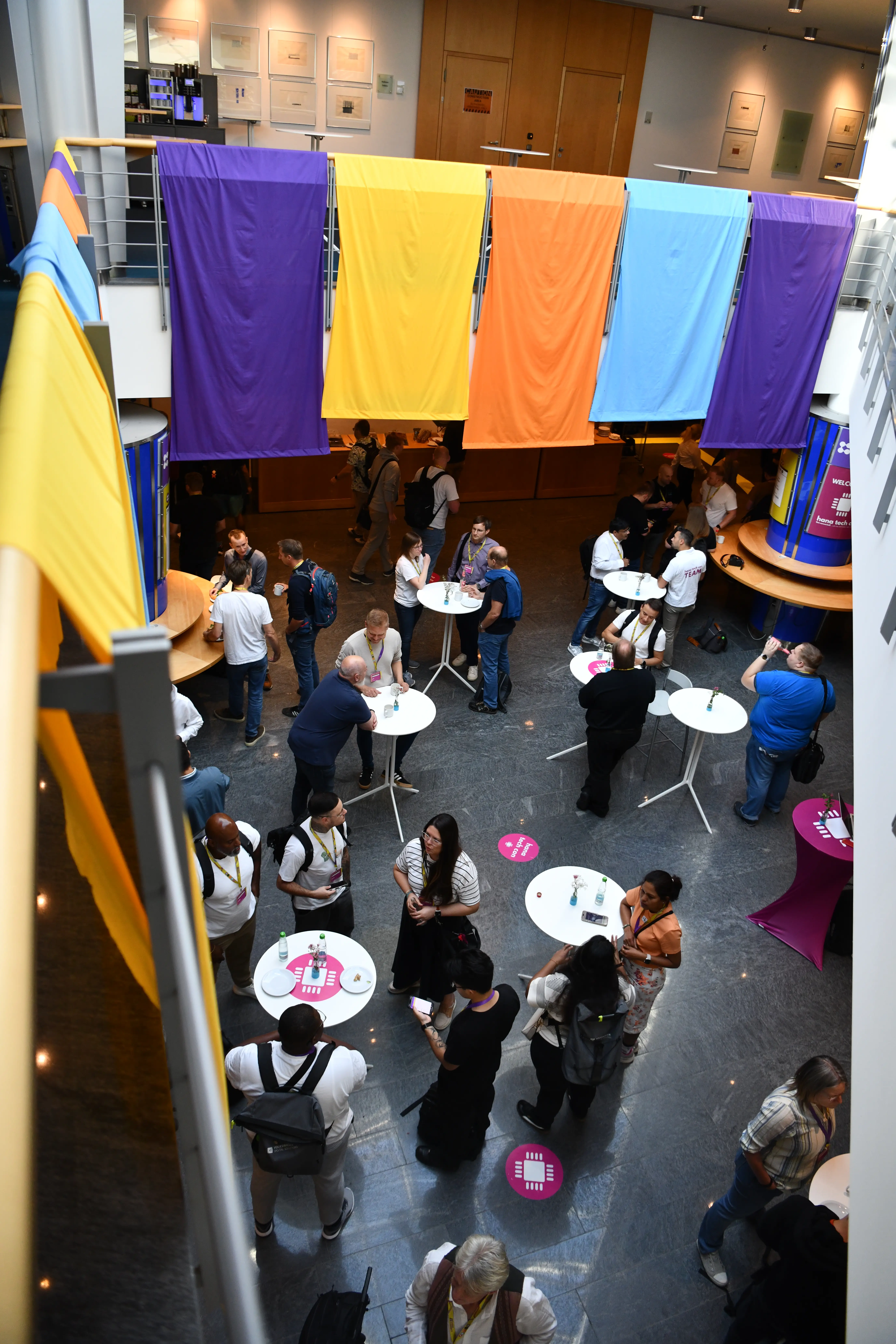 People talking with each other on small tables