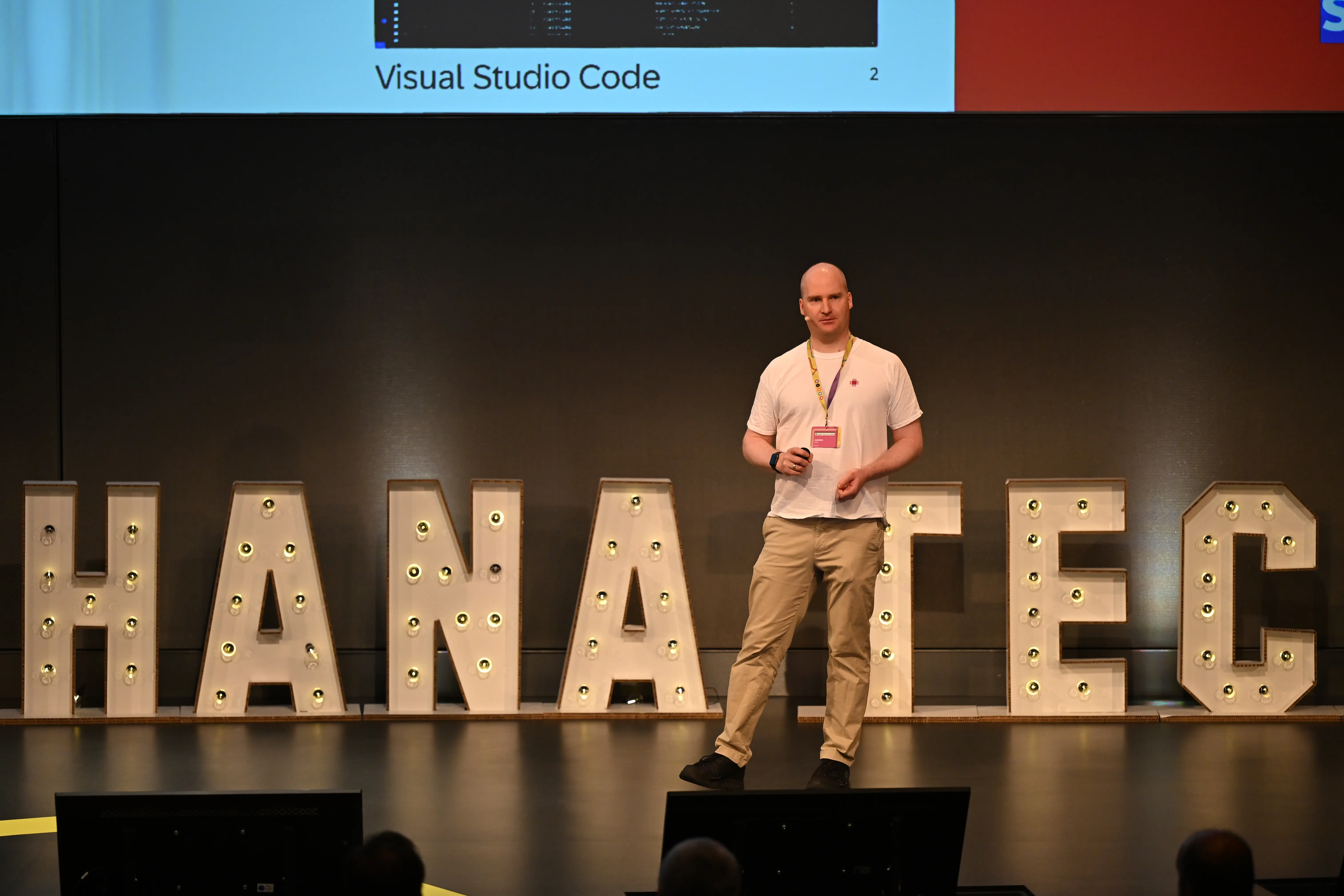 A speaker giving a talk on the main stage