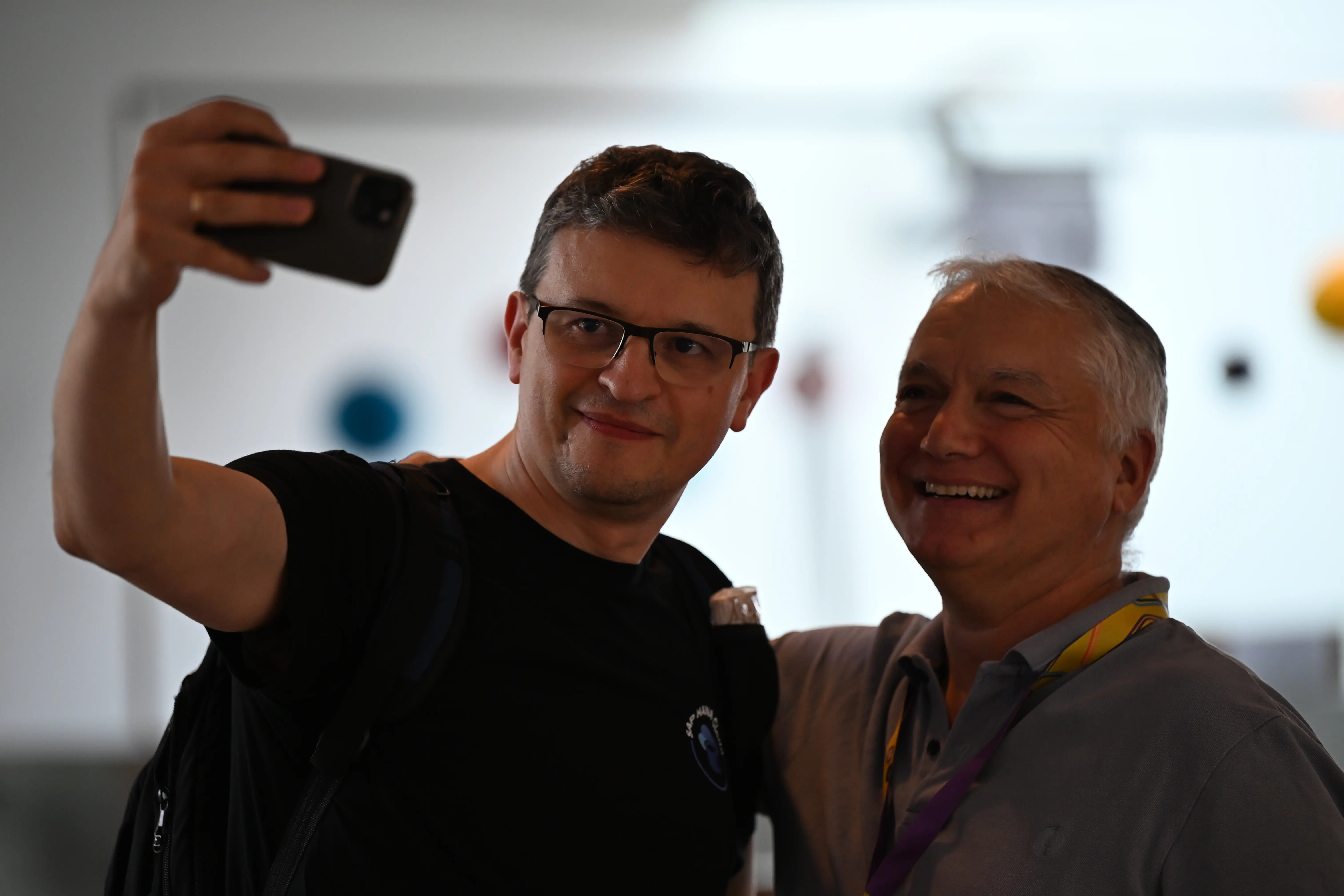 A person doing a selfie with another person